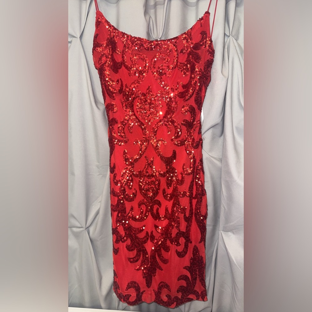 Red sparkly dress open back